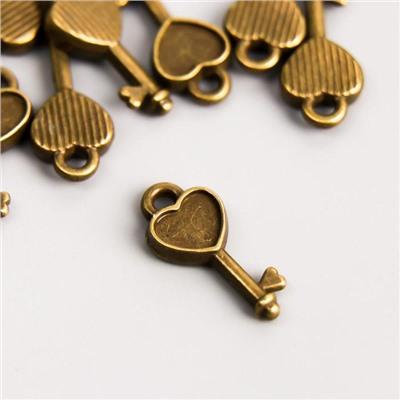 Декоративный элемент "Ключ" цвет бронза 7*16 мм