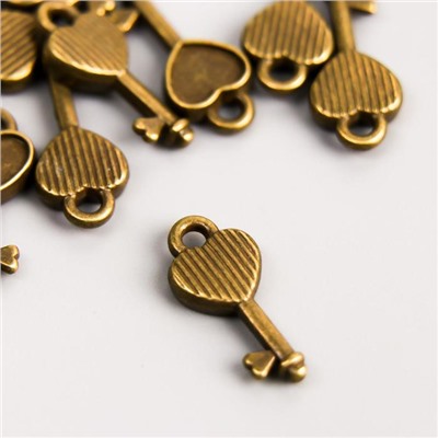 Декоративный элемент "Ключ" цвет бронза 7*16 мм